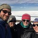 Jeremy, Katlyn, Mackenzie and Ale pose in front of the sea ice.